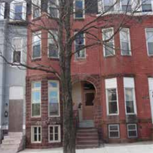 After: The townhouse with its distinctive keyhole entry was completely renovated, inside and out, while maintaining its historic character. (TD Bank)