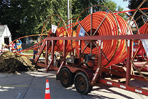 In many rural areas, crews are laying underground fiber-optic cable that connect to or replace cell towers delivering Wifi to residents and businesses.